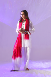 Ivory 3-piece self lawn suit by Zananii featuring embroidered buttons, lace-trimmed sleeves, a farshi shalwar, and a colorful tie-dye dupatta from the Gohar Collection.
