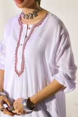 Second White lawn cotton kurta with maroon embroidery on the neckline, paired with a traditional susi shalwar from Zananii’s Andaleeb Collection