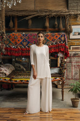 White Irish grip linen shirt and Barochia pants set by Zananii from the Leher Collection
