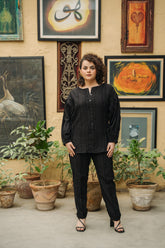 Black ribbon-striped cotton shirt and pants set by Zananii, featuring a short shirt with relaxed fitted trousers. A chic and timeless outfit from the Dastoor Collection.