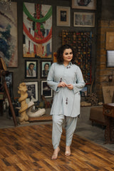 Fourth Powder blue cotton linen embroidered shirt with tulip shalwar by Zananii from the Maahe Collection, featuring delicate embroidery booti detailing.