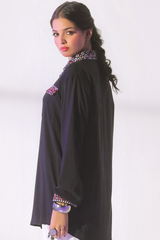 Second Black slub viscose button-down shirt with Ajrak pocket detailing, paired with loose ijaar trousers from Zananii’s Zoya Collection.