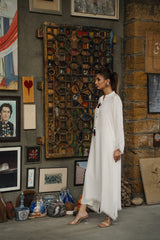 Second White viscose linen kaftan shirt by Zananii from the Saakht Collection, featuring tassel detailing on the collar and soft ruffle accents.