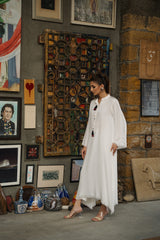 Third White viscose linen kaftan shirt by Zananii from the Saakht Collection, featuring tassel detailing on the collar and soft ruffle accents.
