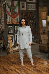 Powder blue cotton linen embroidered shirt with tulip shalwar by Zananii from the Maahe Collection, featuring delicate embroidery booti detailing.