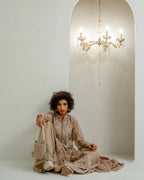Elegant chandelier hanging in arched wall niche with white background