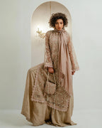 KCT - 01 - Model in nude beige embroidered outfit with chandelier and wall sconce lighting